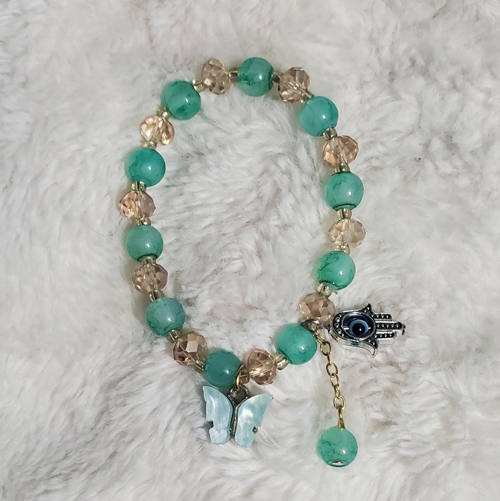 Elegant Beaded Bracelet with Hamsa Charm